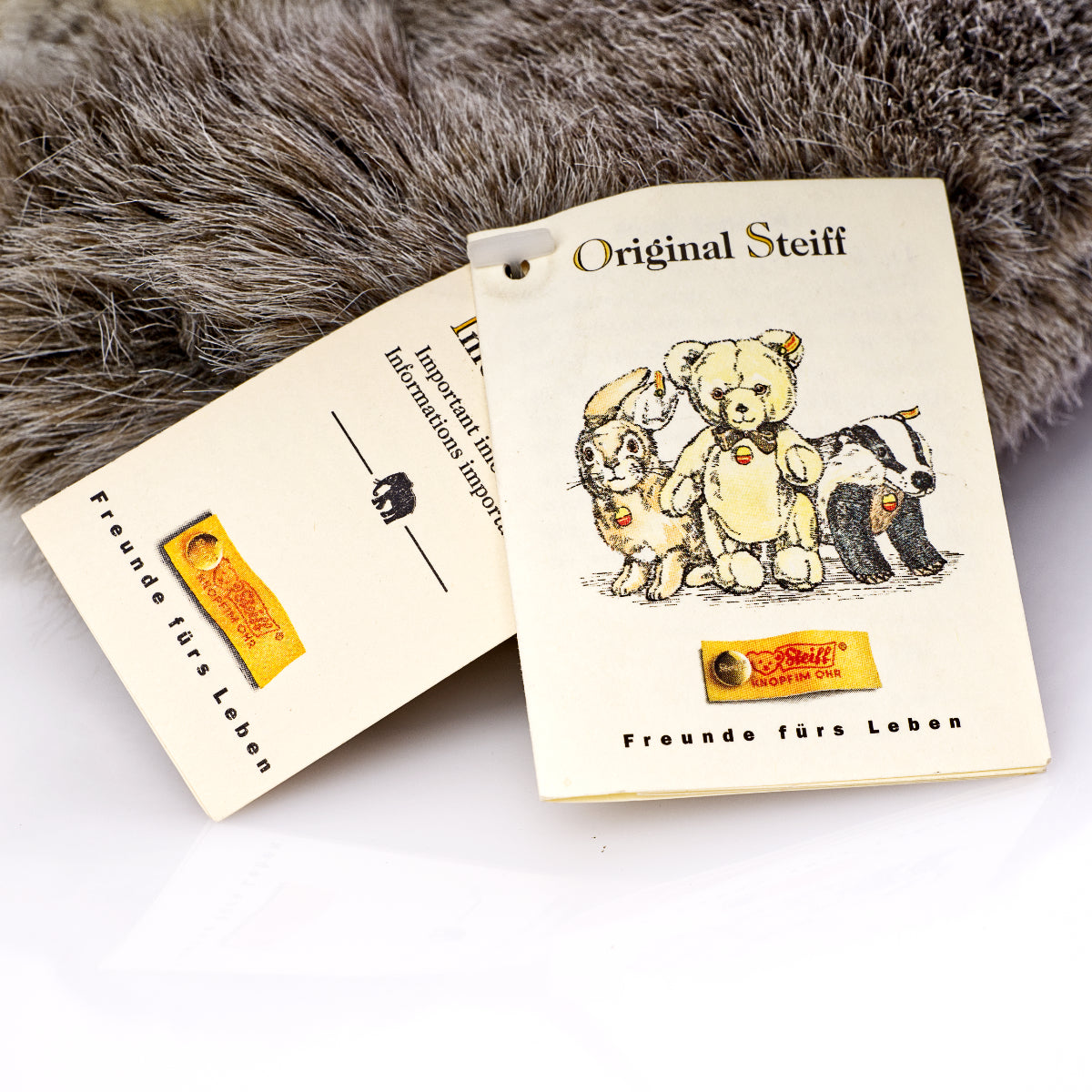 STEIFF - Laying Husky - Yellow Tag 079672, Retired Plush with Tags